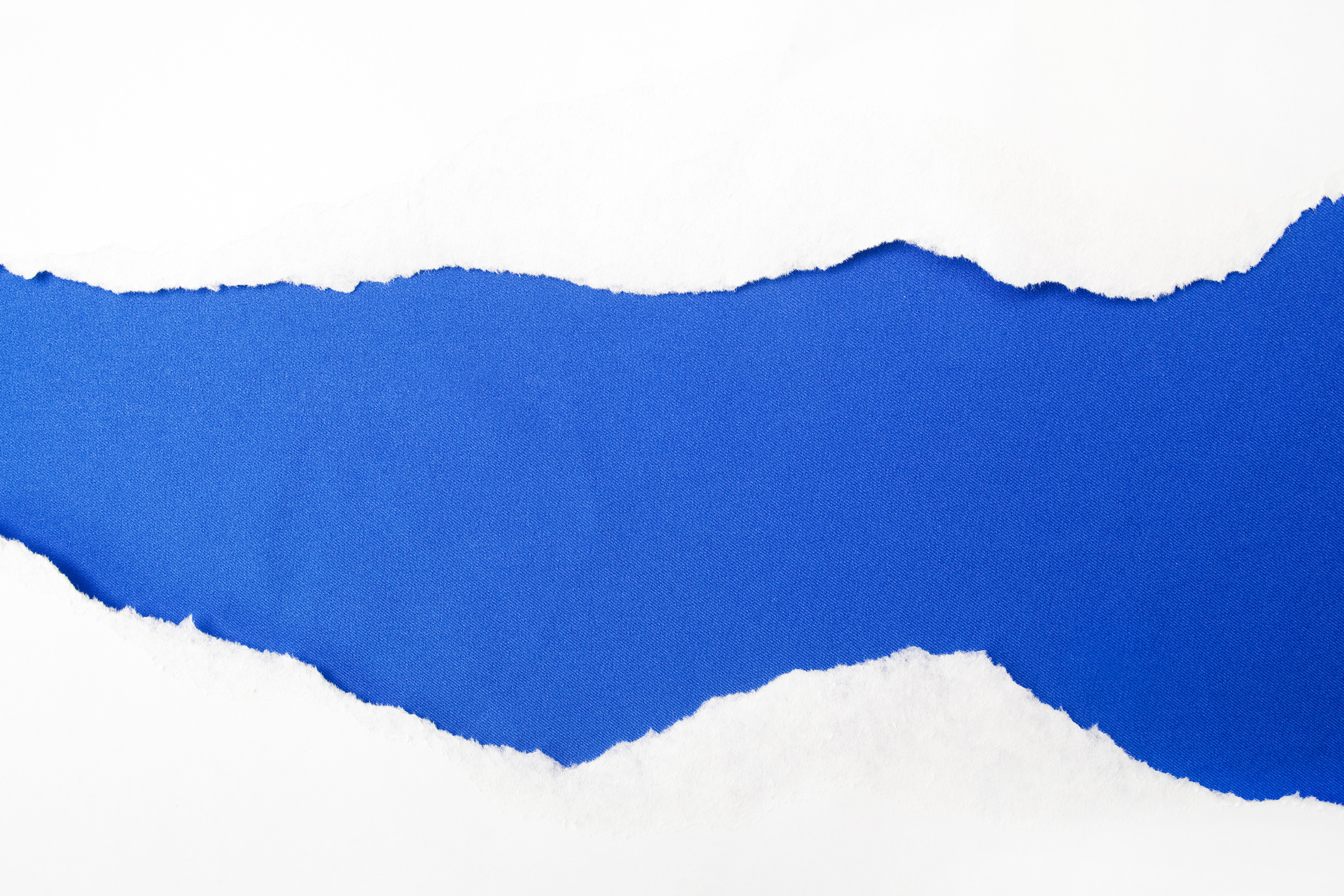 torn white paper on blue background. Cocept for autism awareness day. Break barriers together for autism